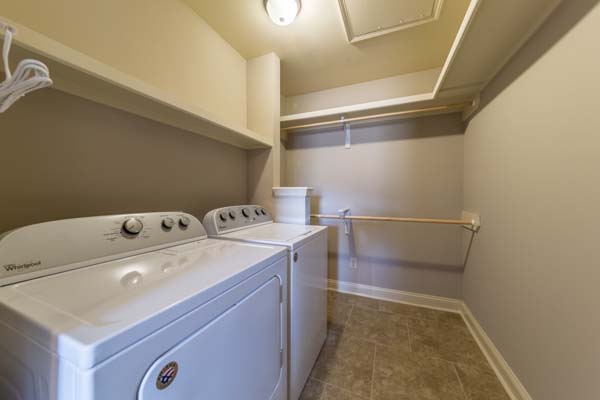 Walk-in Closet with Full Size Washer and Dryer